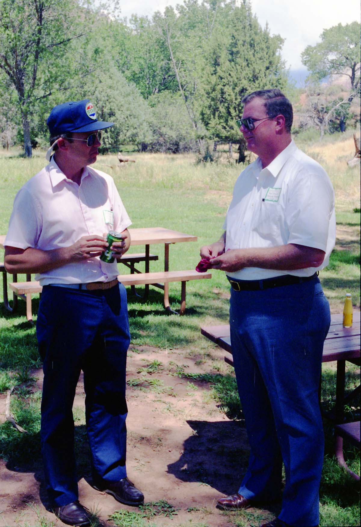Color Photos of the parks 72nd anniversary celebrations- cake cutting, barbecue, speakers.