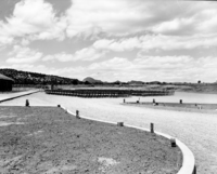 Chairs and grandstand in the parking area set up prior to dedication of new Tribal and National Park Service Visitor Center and 50th anniversary celebration at Pipe Spring National Monument.