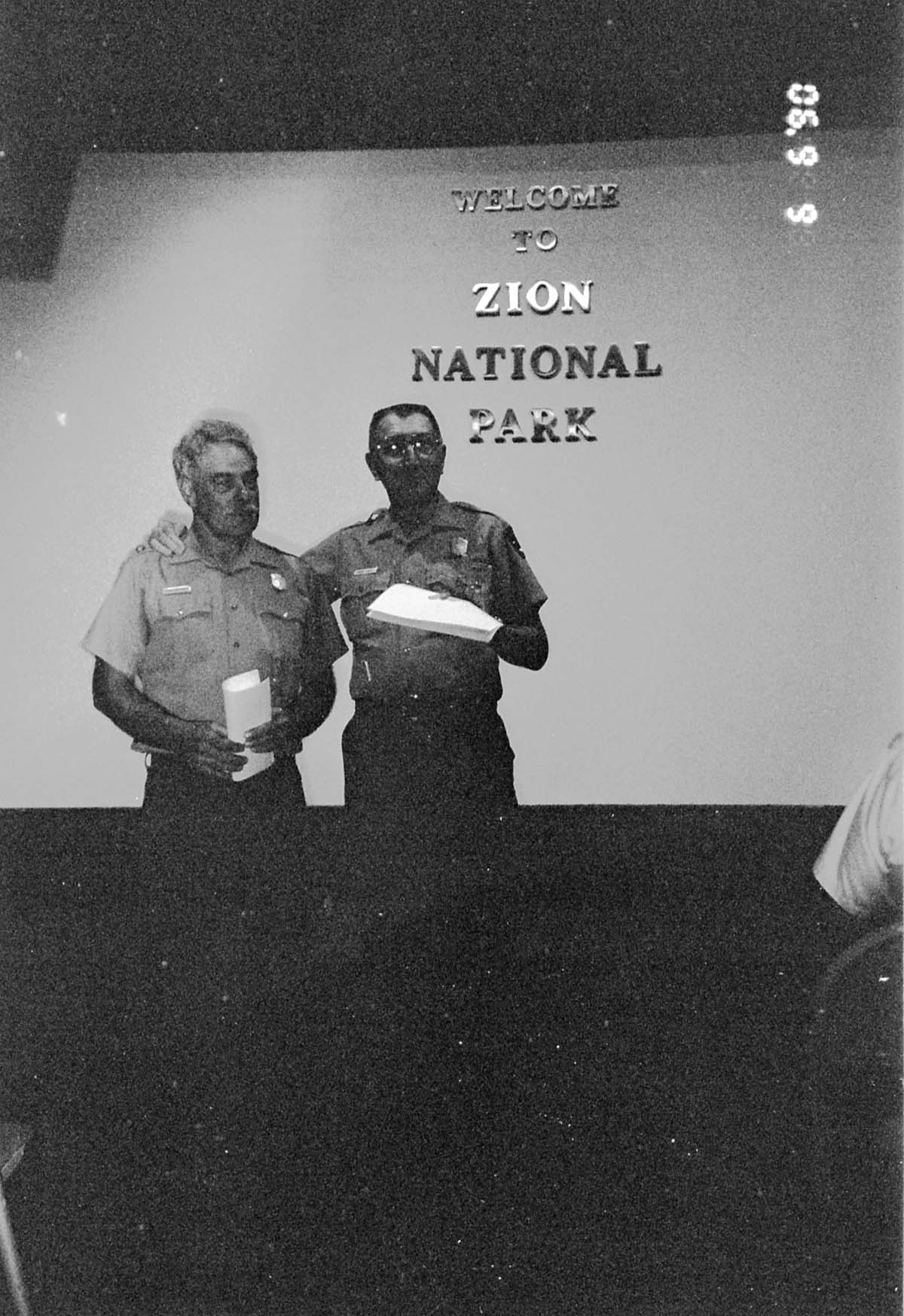 BW Photos of Superintendent Harold Grafe giving out awards to park personnel.