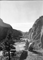 Hop Valley view down canyon with person kneeling in foreground.