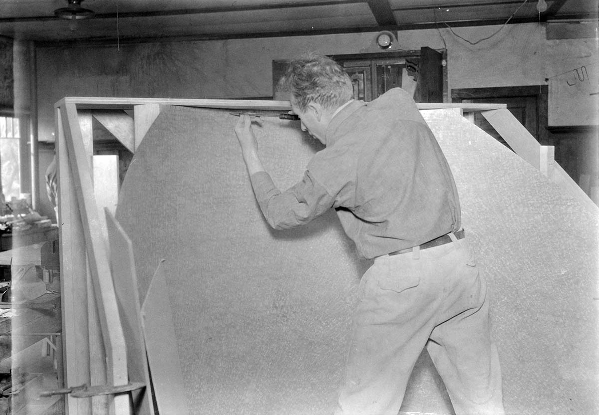 Western Museum Laboratory (WML) worker constructing exhibit case panels for the Zion Museum.