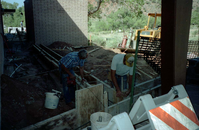 Workers during the construction of headquarters addition.