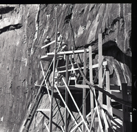 Wooden scaffolding and workers used for upgrade of water system at Temple of Sinawava.