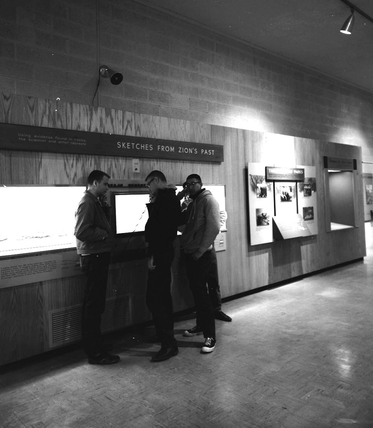 Interior of the Zion Museum space with visitors looking at exhibits.