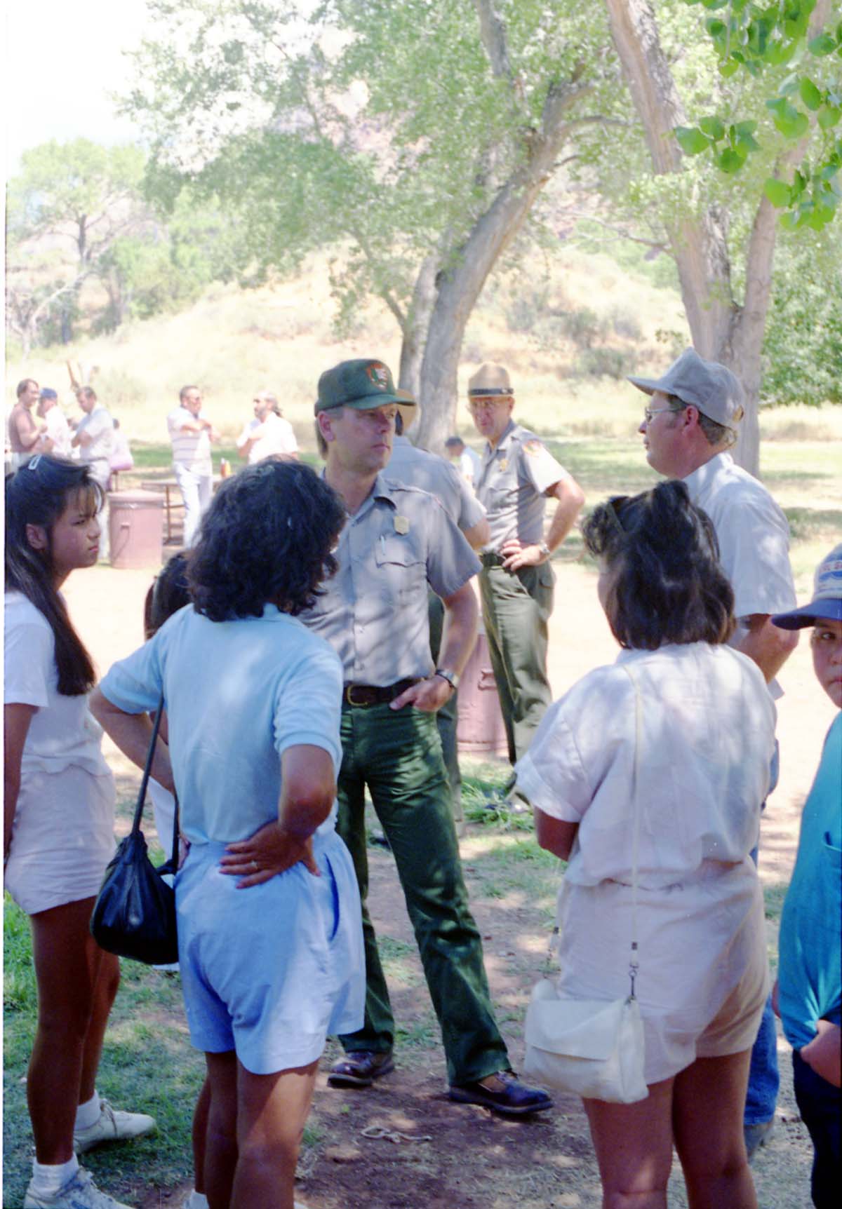 Color Photos of the parks 72nd anniversary celebrations- cake cutting, barbecue, speakers.