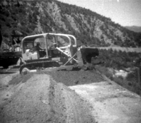 BW photos of rock slides in Kolob Canyons - 110mm. Bulldozer clearing rock slide off roadway.