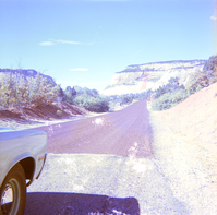 Road after chipsealing and Zion landscape in the background.