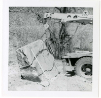 Construction vehicle placing rock during the Lady Mountain sign emplacement.