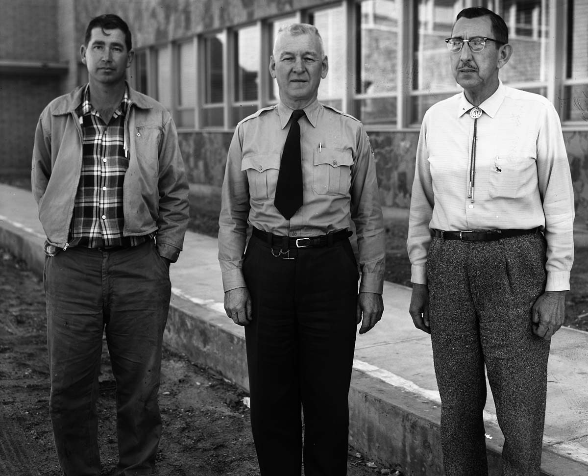 incentive award winners standing outside park headquarters, left to right: Roy O. Curbow, Charles E. Humberger, Joseph O. McCabe.