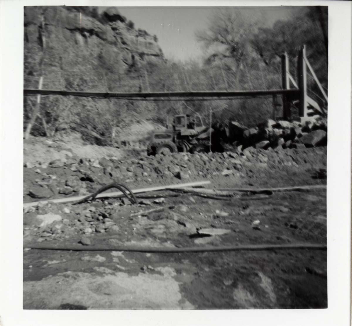 Protection/stabilization of the footings for the old Birch Creek suspension footbridge.