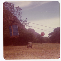 Construction equipment for Wiley Tank being transported on tramline.