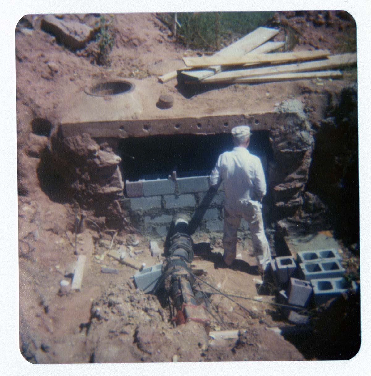 Men working on the construction of the Springdale water pipeline.