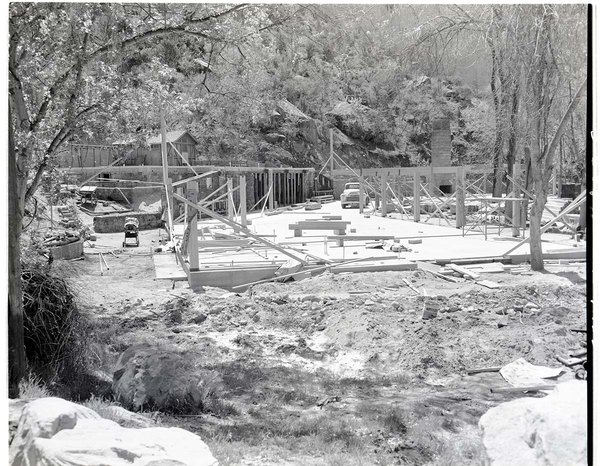 Rebuilding Zion Lodge after fire of January 28, 1966 - beginning of walls and beams of recreation hall.