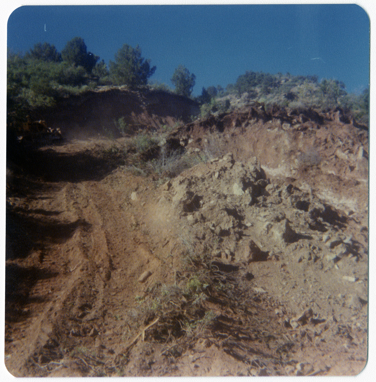 Rocky, dirt road in need of repair in Kolob Canyon.