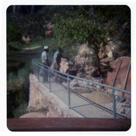 Men working on trail by the new Grotto footbridge.
