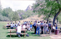 Color Photos of the parks 72nd anniversary celebrations- cake cutting, barbecue, speakers.