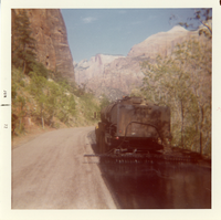Construction vehicle chipsealing Zion roads.