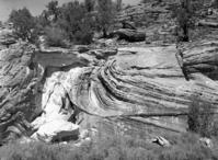 Cross bedding in Navajo sandstone, fluted walls of Navajo sandstone.