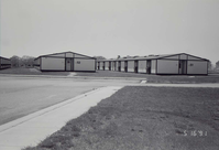 Barracks and parking area. Building numbers 51 and 52. [Image possibly for comparative housing study]