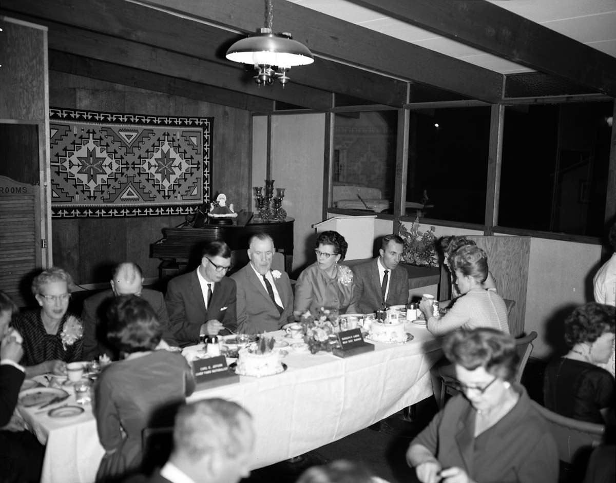 Retirement party for Carl E. Jepson and Rudy Lueck at Grandma's Kitchen. Left to right: Ester and Carl E. Jepson, Warren Hamilton, Rudy and Eulah Lueck, Bill Binneweis.
