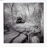 Cleaning and clearing in campground area.