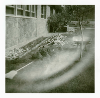 Landscaping activities along the exterior of the old Mission 66 Visitor Center and Museum grounds.