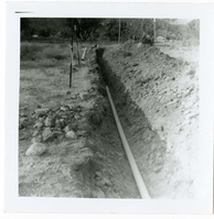 Pipe in ditch during the Watchman housing utility project.