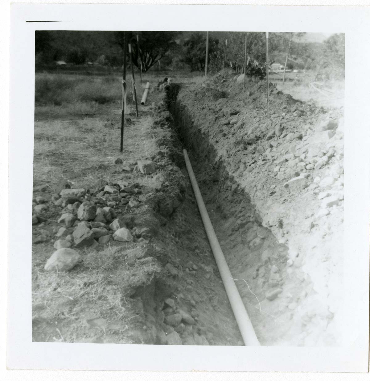 Pipe in ditch during the Watchman housing utility project.