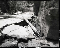 Damage done by storm of July 25, 1954 to West Rim Trail. Section of undermined trail in Refrigerator Canyon.
