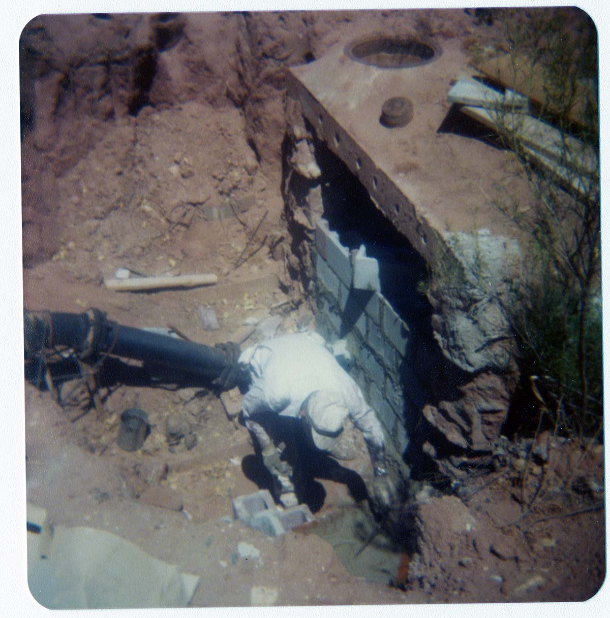 Men working on the construction of the Springdale water pipeline.