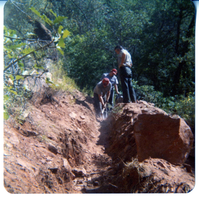 Workers excavating ditch.