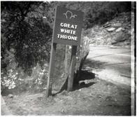 BW Photo of a rock slide along Route 2 - 110mm. Sign damage.