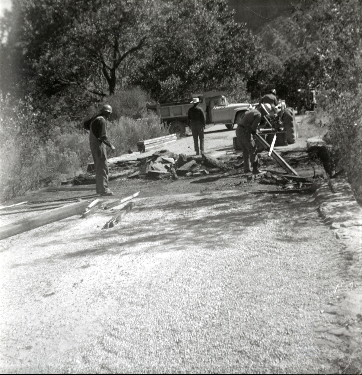 Men working to construct a section of road along the scenic canyon drive near the Grotto.