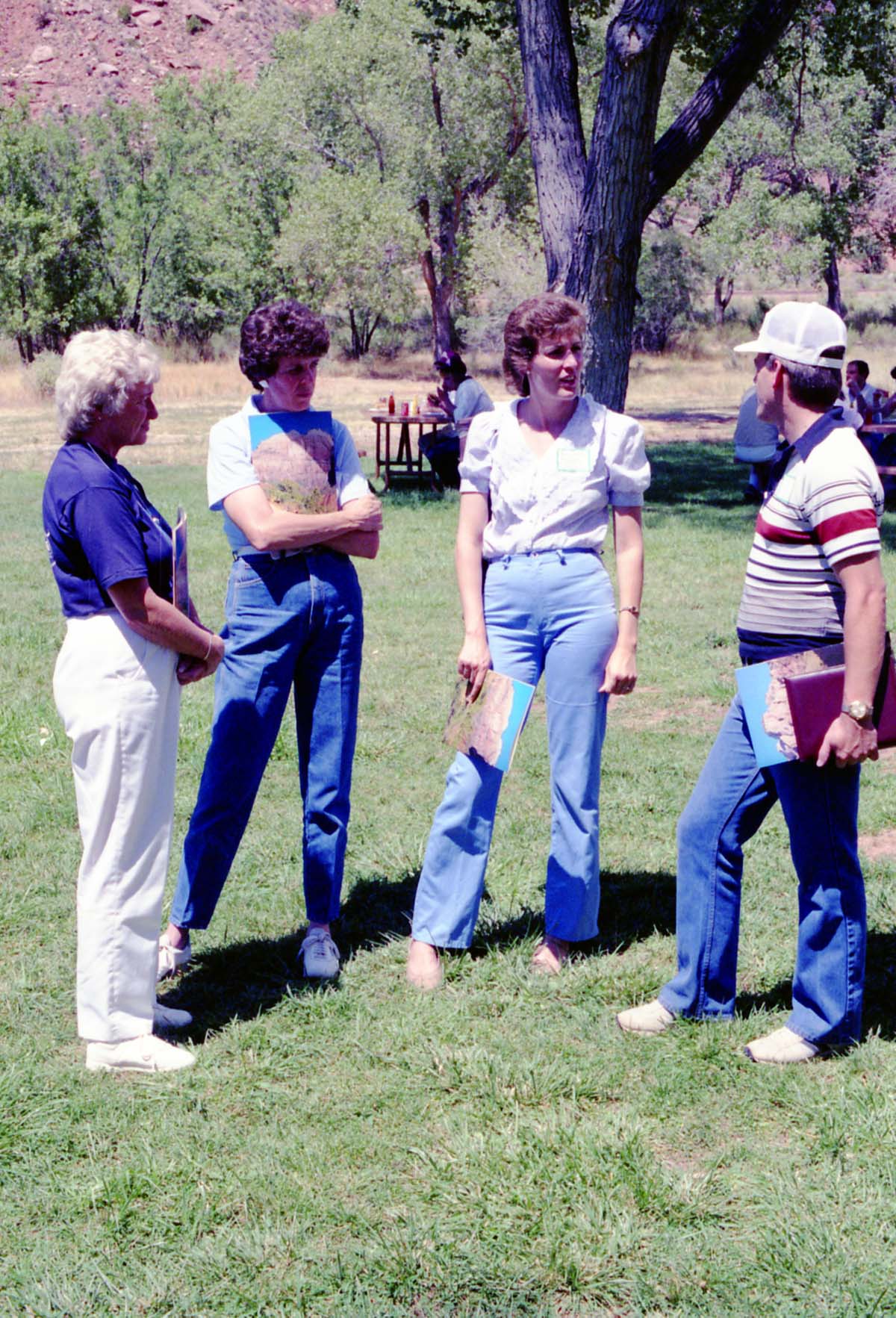 Color Photos of the parks 72nd anniversary celebrations- cake cutting, barbecue, speakers.