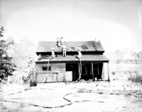 Fire prevention training; demonstration for students of Springdale school. Burning of old Justet home adjacent to Springdale school.