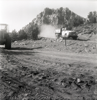 Construction vehicles working during road grading to Chamberlain Ranch and the Narrows.