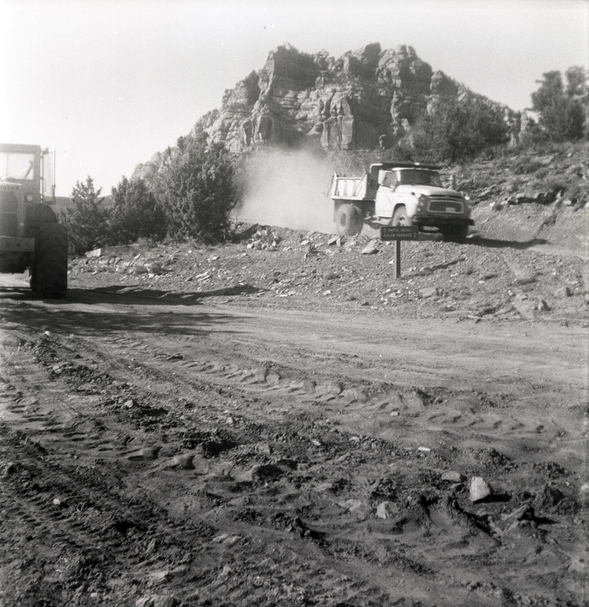 Construction vehicles working during road grading to Chamberlain Ranch and the Narrows.