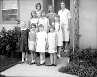 The women and girls of the Zion Canyon 4-H Cooking Club pose after winning at the Washington County Fair, June 1967. Back row left to right: C. Fisher, C. Hagood, L. Langan. Middle row left to right: Schaack, Brueck, Langan. Front row left to right: L. Hagood, P. Fisher, P. Hagood, P. Langan.