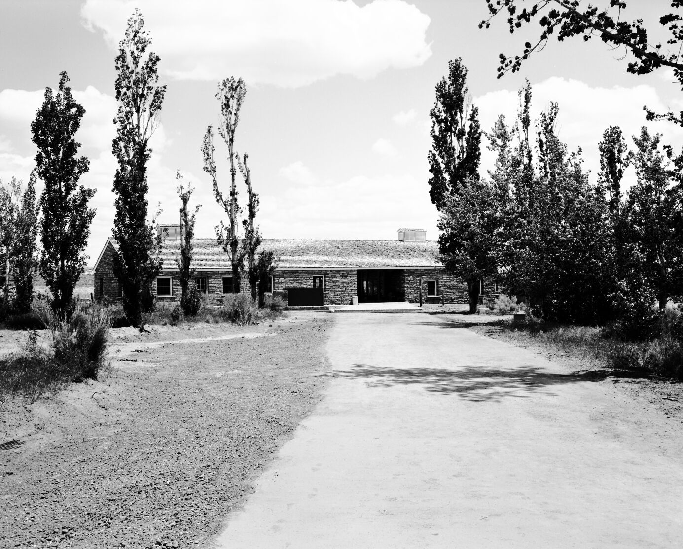 The entrance sign at rear of the new Tribal and National Park Service Visitor Center prior to the dedication ceremony and 50th anniversary at Pipe Spring National Monument.