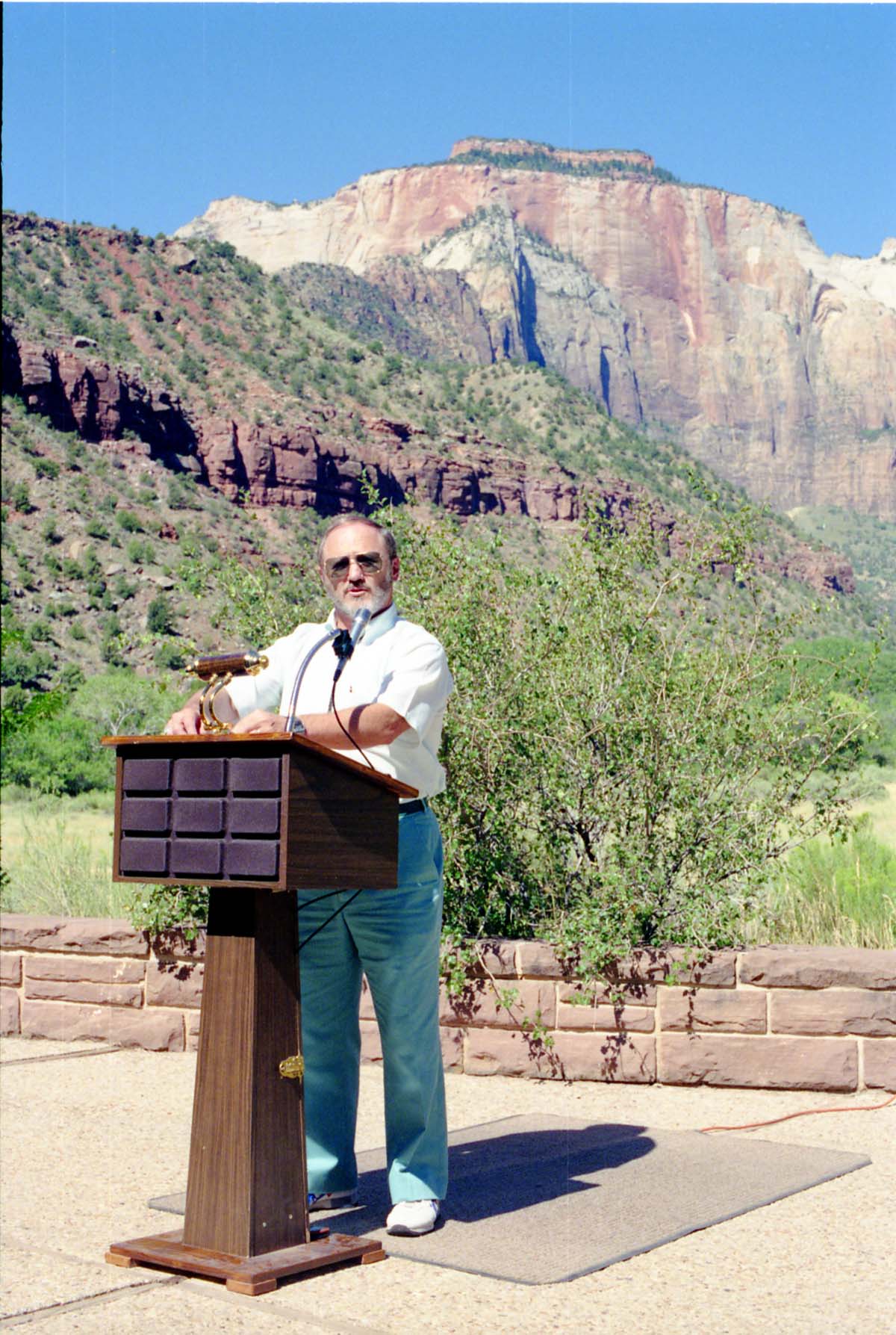 Color Photos of the parks 72nd anniversary celebrations- cake cutting, barbecue, speakers.