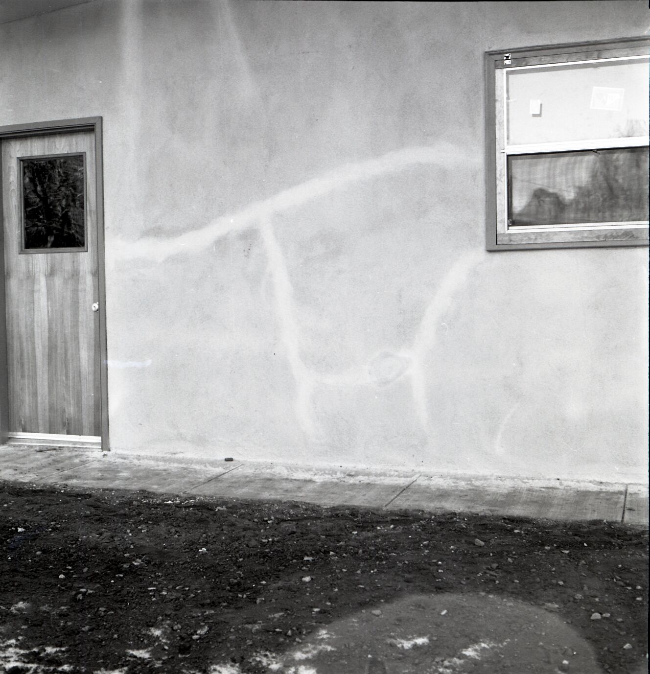 Cracks in stucco of new homes in Watchman Housing Area. Documented: Building 34; Building 35; Building 36.