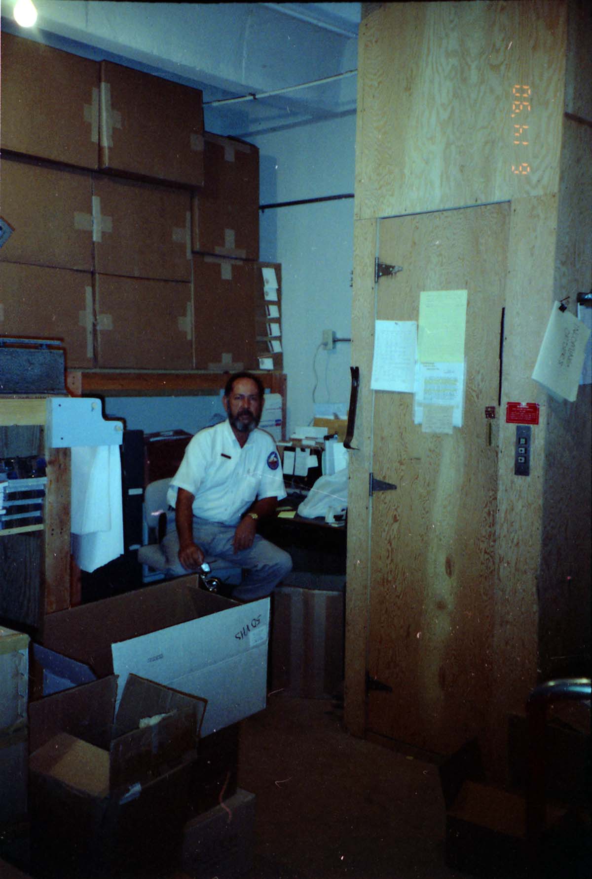Man working on construction of headquarters addition.