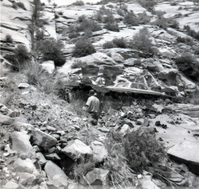 Car parked on road and man surveying area during East side road repair and turn our construction - Road projects 5104 and 5105.