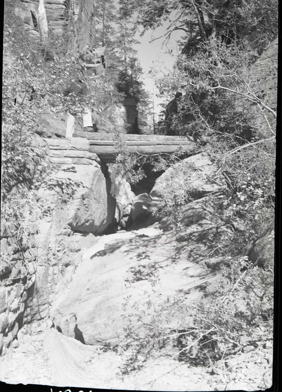 Bridge near mouth of Refrigerator Canyon, West Rim Trail, large boulders to be removed to help drainage under bridge.
