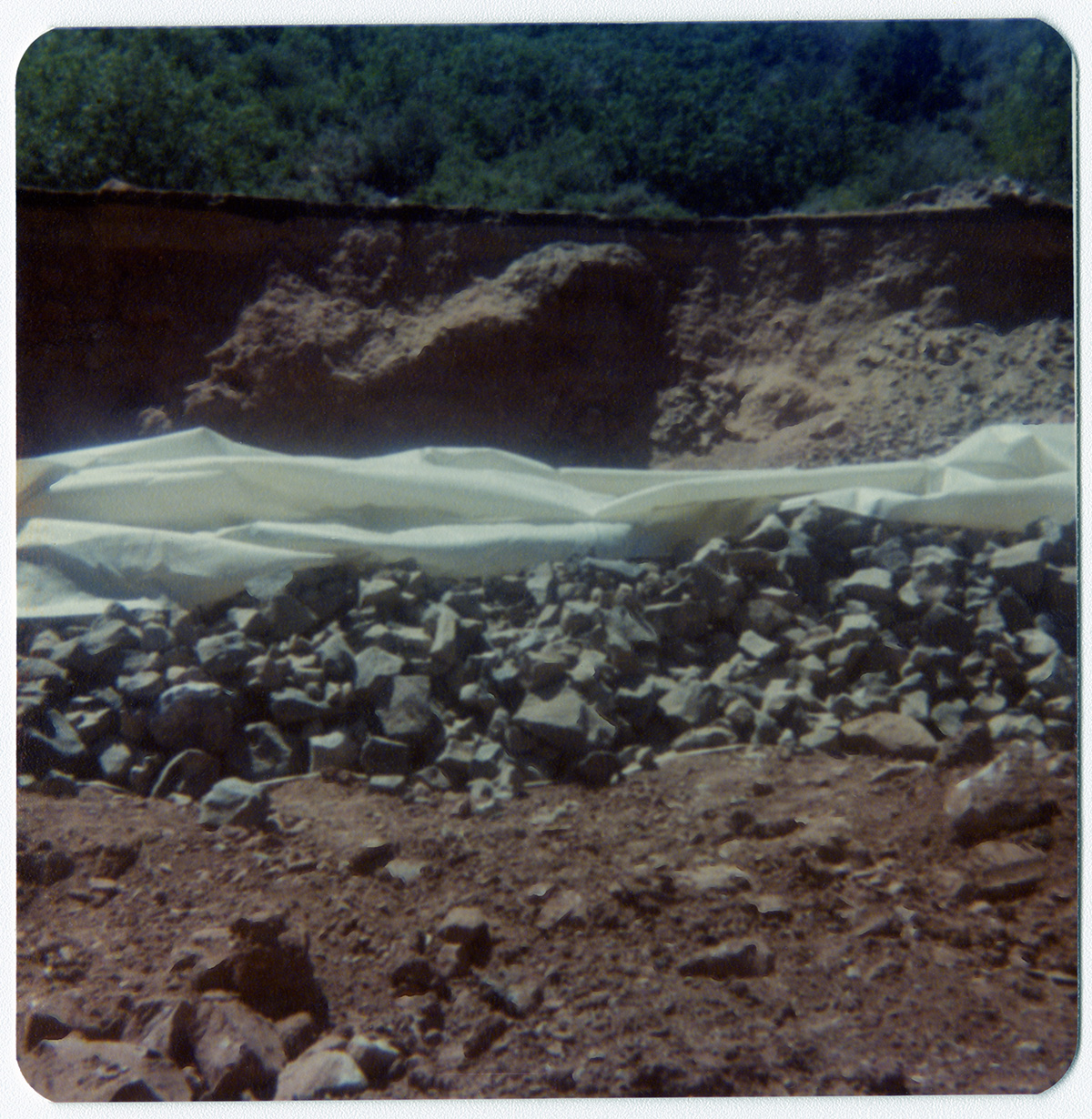 Rock pile with tarp covering during road work/repair in Kolob Canyon.