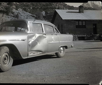 Mock accident to illustrate result of careless driving.