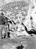 New Dodge pickup in Building 83, smashed by 40-ton rock, due to rock fall at Oak Creek maintenance area. Pickup had been driven less than 100 miles.
