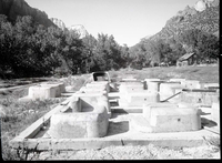 Cinder concrete, monolithic cast fireplaces in South Campground.