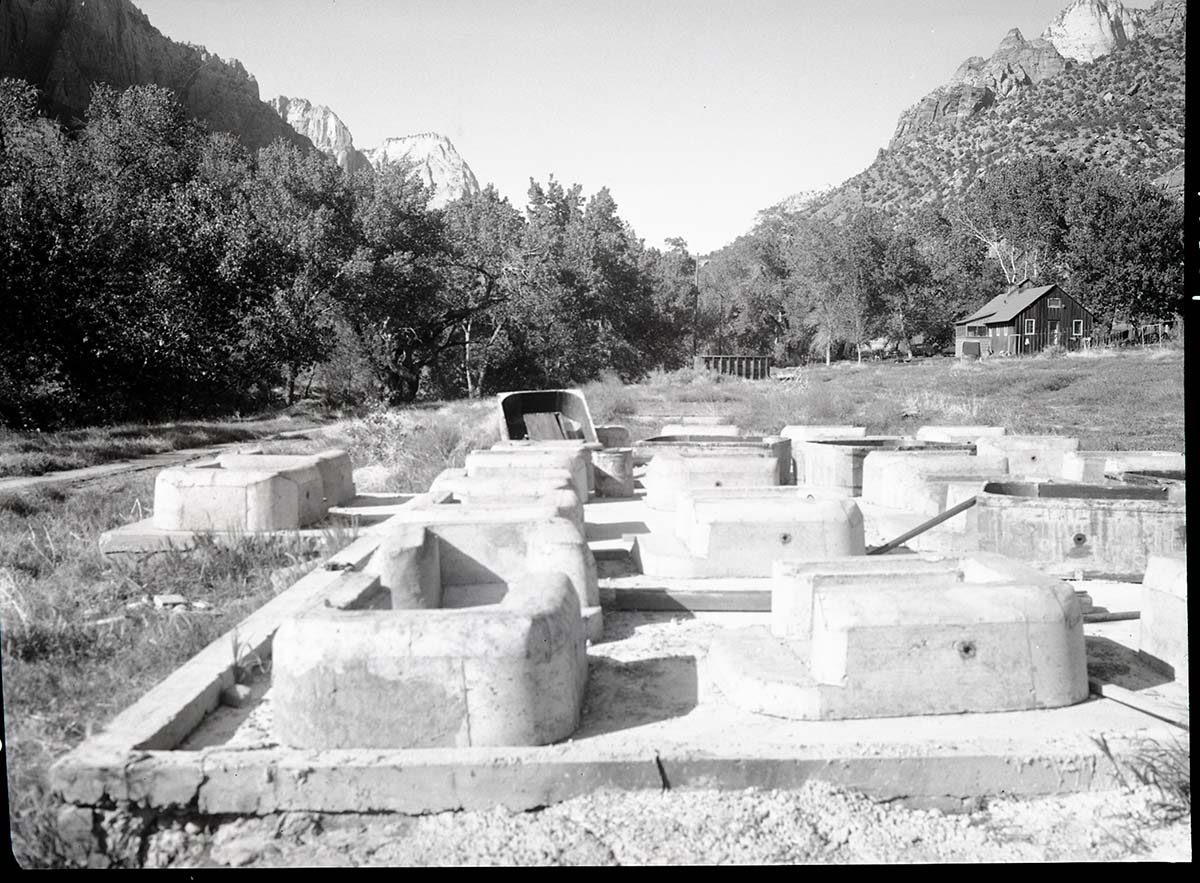 Cinder concrete, monolithic cast fireplaces in South Campground.