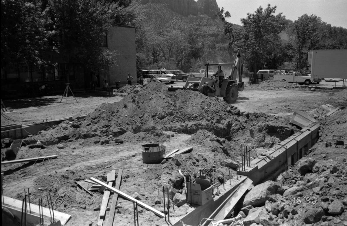 Construction vehicle being operated during construction of headquarters addition.